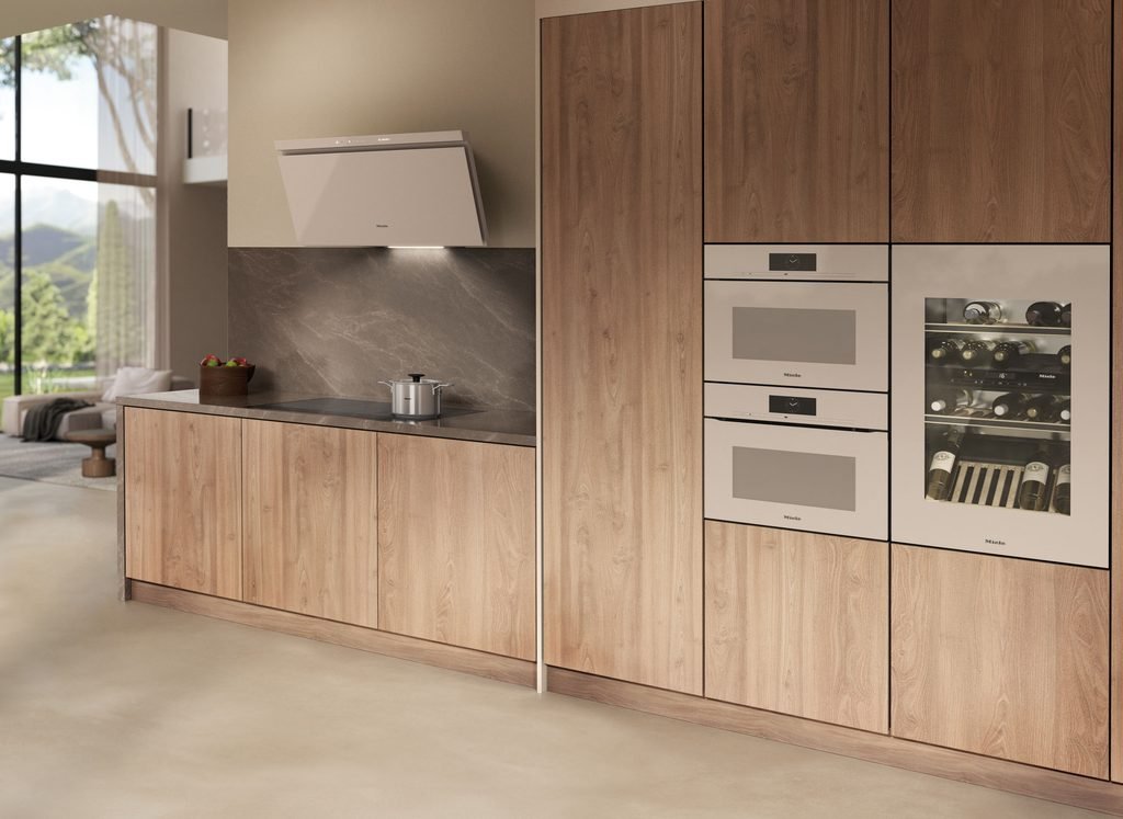 Miele ArtLine built-in kitchen appliances in Pearlbeige with handleless glass fronts